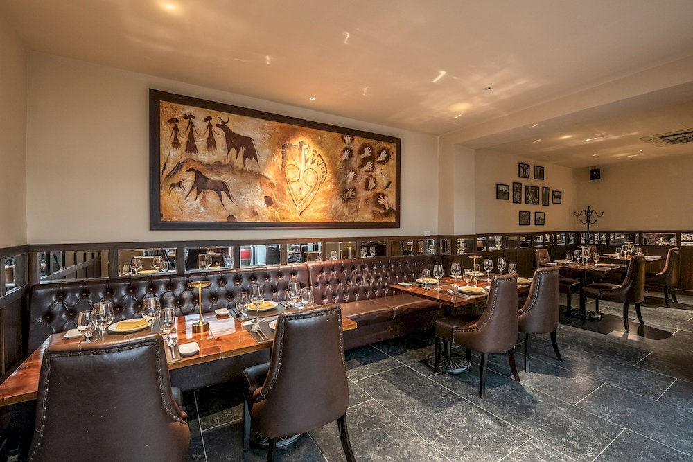 Rico South American Steakhouse resembles a European villa with cozy lighting and seasonal decorations